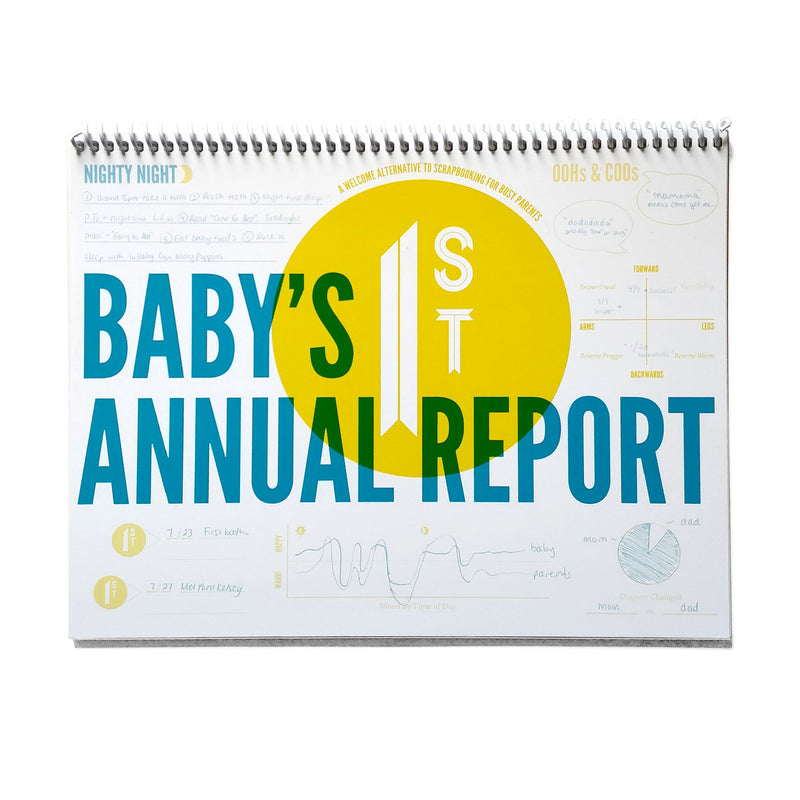 Baby's First Annual Report book with colorful text on a white background